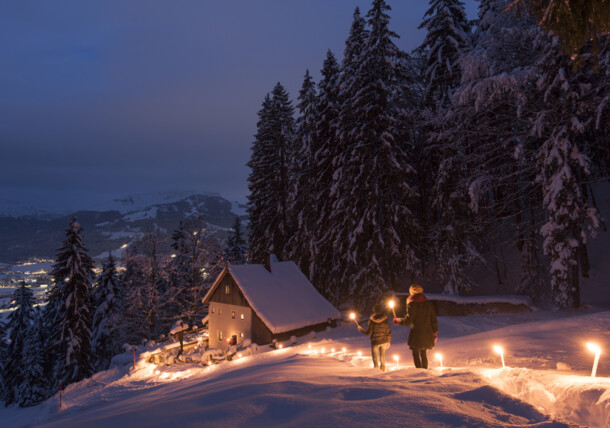     Torchlight hike in winter to the Maria Blut hermitage in St. Johann in Tyrol / St. Johann in Tirol